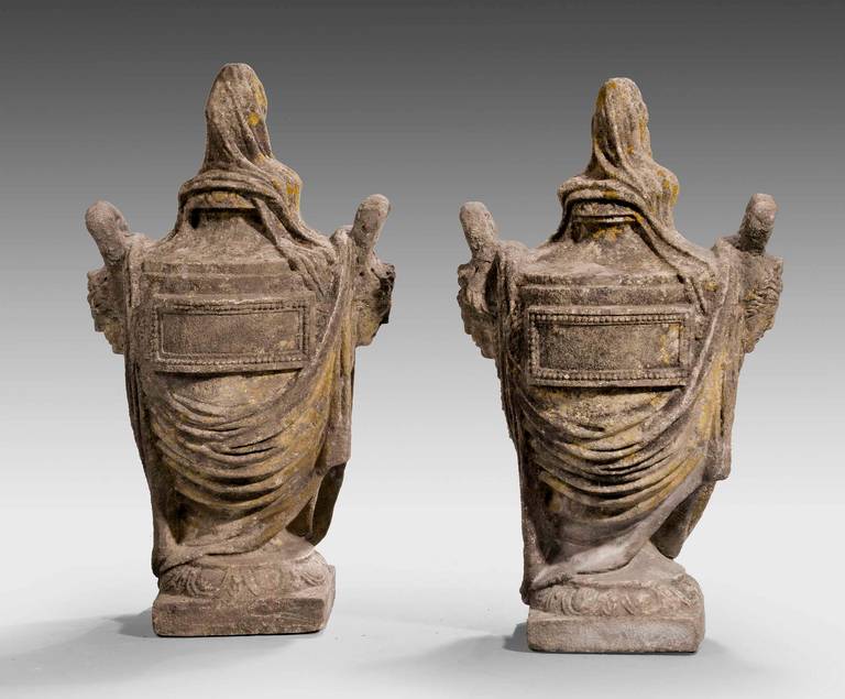 A fine pair of mid-18th century stone vases in the form of valed urns. Showing strong Adam influence. Ex harwood house North Yorkshire.