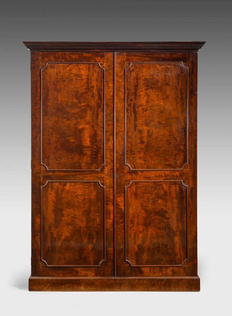 A good Chippendale period mahogany wardrobe. The panels particularly fine figured with wild timbers.