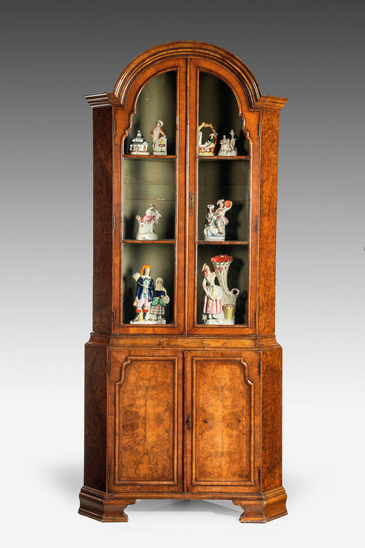 British An Early 20th Century Walnut Cupboard of Queen Anne Design For Sale
