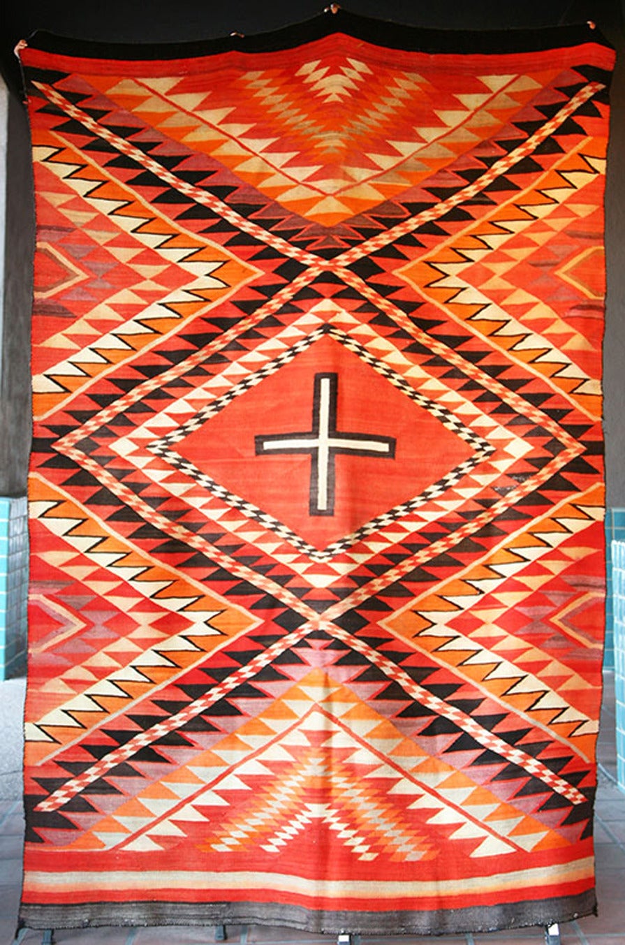 Eyedazzler Navajo blanket c.1890's very good condition, few minor stains and one area of very faint color transfer in the orange, otherwise very good condition.  Churro Wool, soft enough could be used on a king sized bed.  The use of purple is