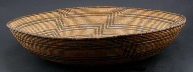 Large Apache tray. Minor stitch loss.
