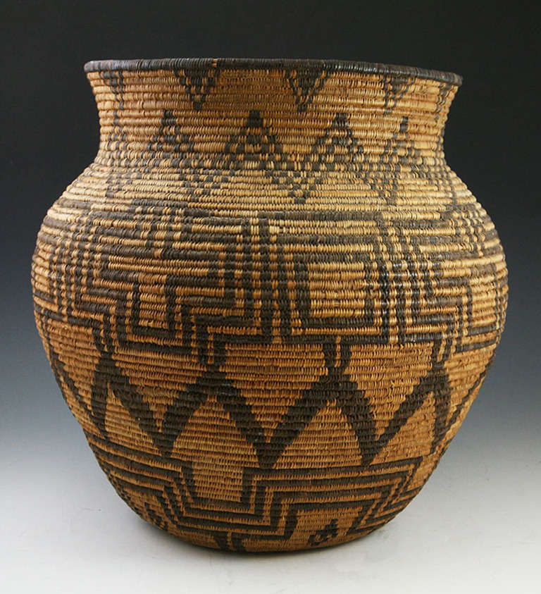 Large Western Apache olla, early example.  Some minor stitch loss and slight lean.  Very tight stitches.