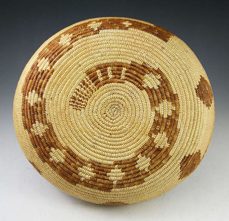 Rare Mission basket rattlesnake design. This basket was made in the 1920s near San Diego California. Similar baskets can be found at the Palm Springs Art Museum. Acquired out of a private collection in Arizona. The owner has authorized us to lower