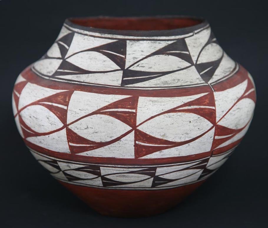 Acoma/ Laguna polychrome pot, circa 1890-1900. Typical surface wear.