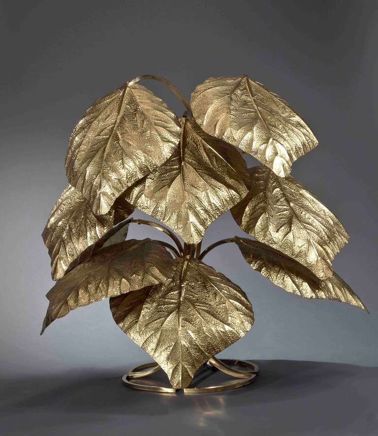 A Rare Large Lamp With Nine Leaves by Tomasso Barbi made of gilded and patinated brass.