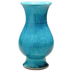 A Turquoise glazed carved Hu form vase
