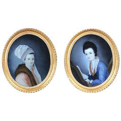 Pair of Oval Reverse Glass Portraits