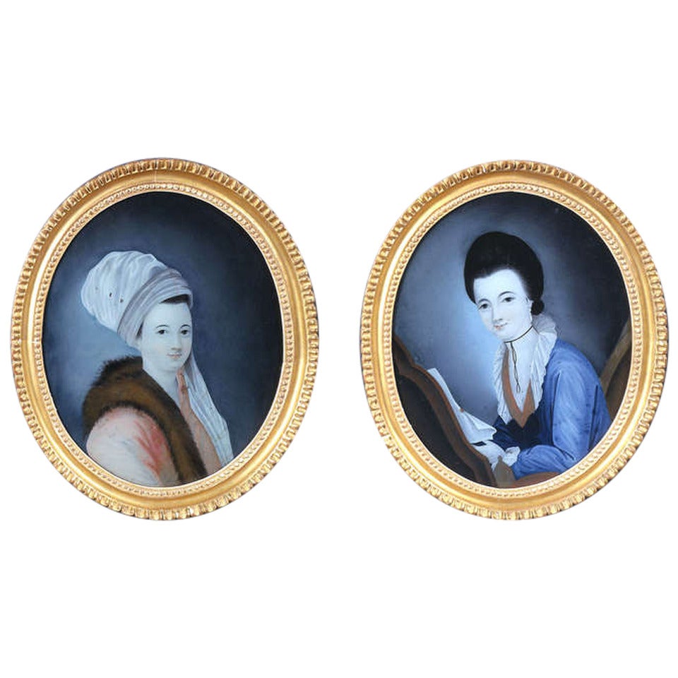 Pair of Oval Reverse Glass Portraits For Sale