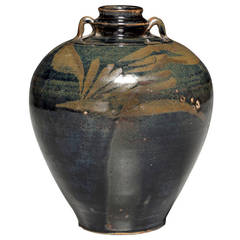 A Henan Black Glazed Jar with Brown Floral Splashes and Ring Handles