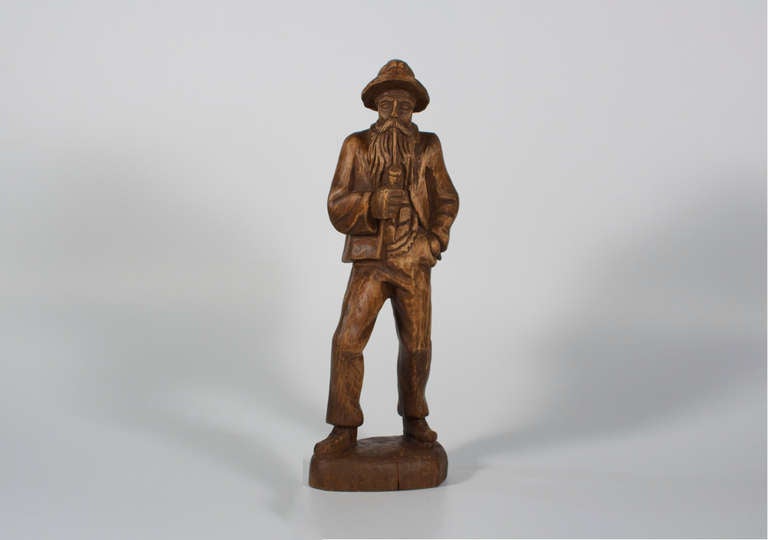 Very Old Carved Lumberjack in Glad Rags