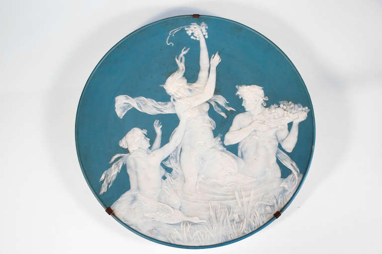 decorative wall plate from Villeroy&Boch Mettlach Saar around 1900; aphrodite or anadyomene, born in the meerschaum, riding on a dolphin and fed by young dionysos and circe, celebrating the power of nature in the elements. very mighty testimonial of