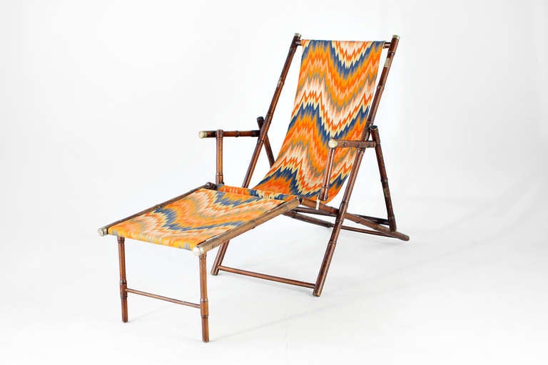 this authentic eye catcher is complete and in mint condition, was repaired professionally at one hinge shortly after production very early. sesationell patina and african exotic cubistic seat fabric, which makes the piece unique. usable even for