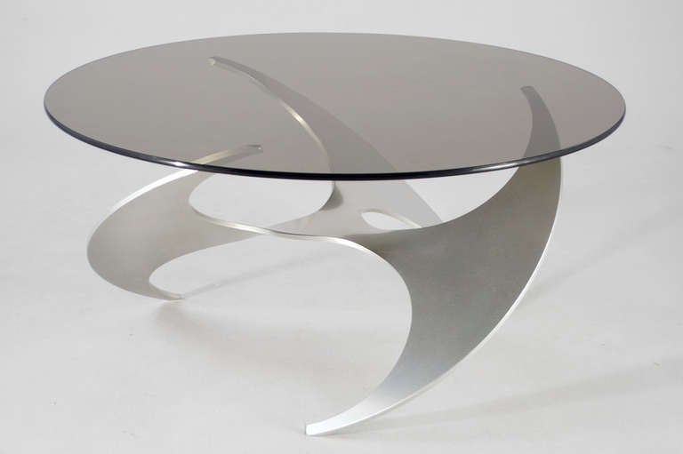 in 1964 mr. hesterberg created his famous propeller table, base is polished aluminum, plate out of smoked glass