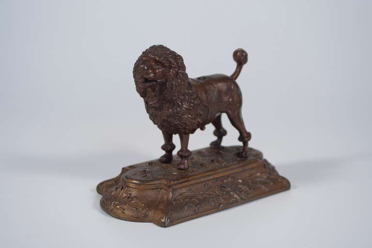 this copper poodle is an antique cigar cutter on gründerzeit ornamented base. DRG Musterschutz