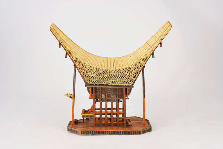 very meticulously handmade sculpture of a japanese farmhouse in protruding silhouette with original materials
