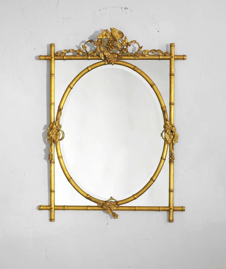 Antique Gold Metal Leaf Finish 
Clear Mirror Oval beveled Mirror