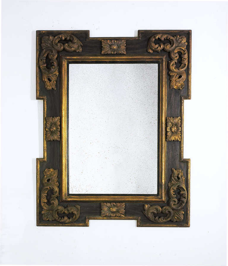 Background crackled faux rosewood with crackled antique gold mouldings.
Center mirror panel with faux antique finish.