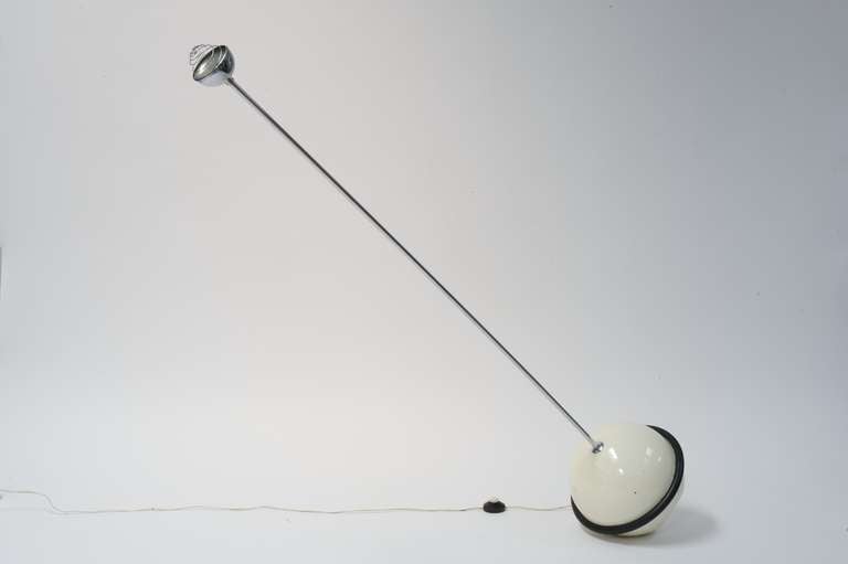 Floor lamp ALOA designed 1971 by Claudio Salocchi for Sormani
the spherical base of the lamp contains the transformer and some ballast. This allows several positions of the lamp.
for 12V halogen light source

Measure: Ø 34 cm / 13,39 in, h 175