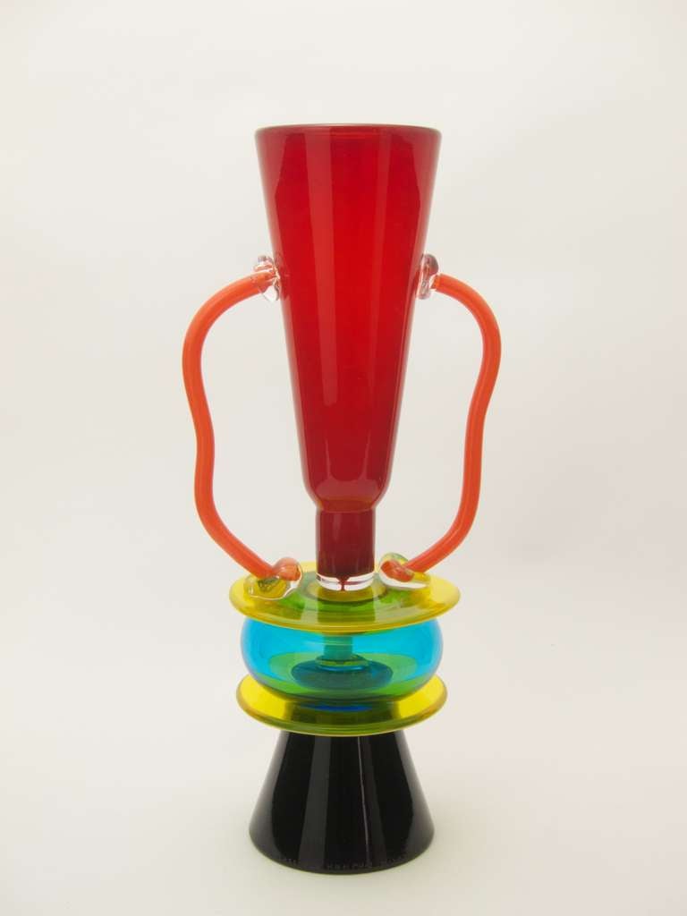 Vase SIRIO by Ettore Sottsass for Memphis Milano

signed: E. SOTTSASS PER MEMPHIS MILANO
multi - colored blown glass
produced by: Gino Canedese & Figlio, Venedig