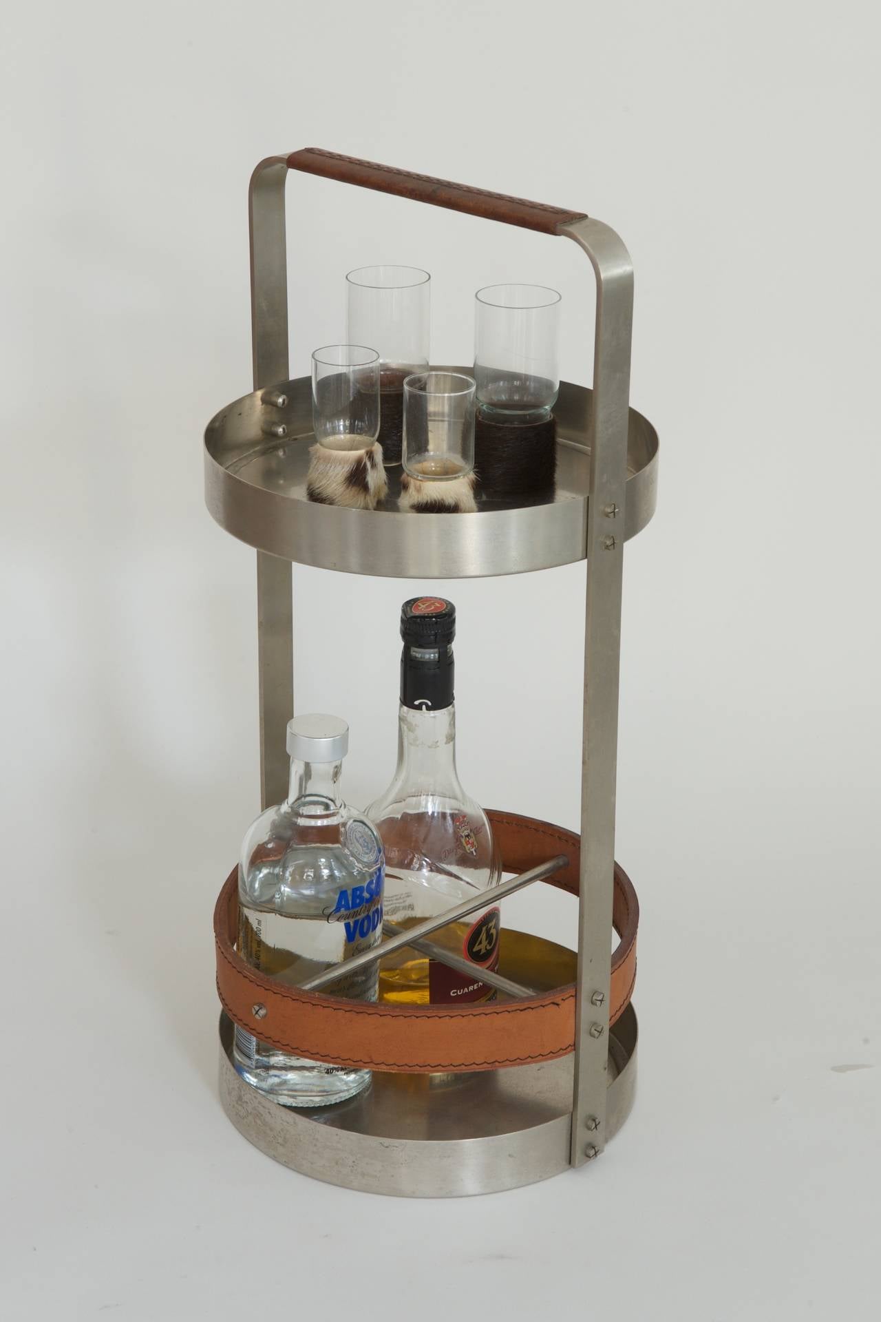 Portable Bar by Carl Auböck, 1960s
Mod. 5362
nickel-plated brass, leather.