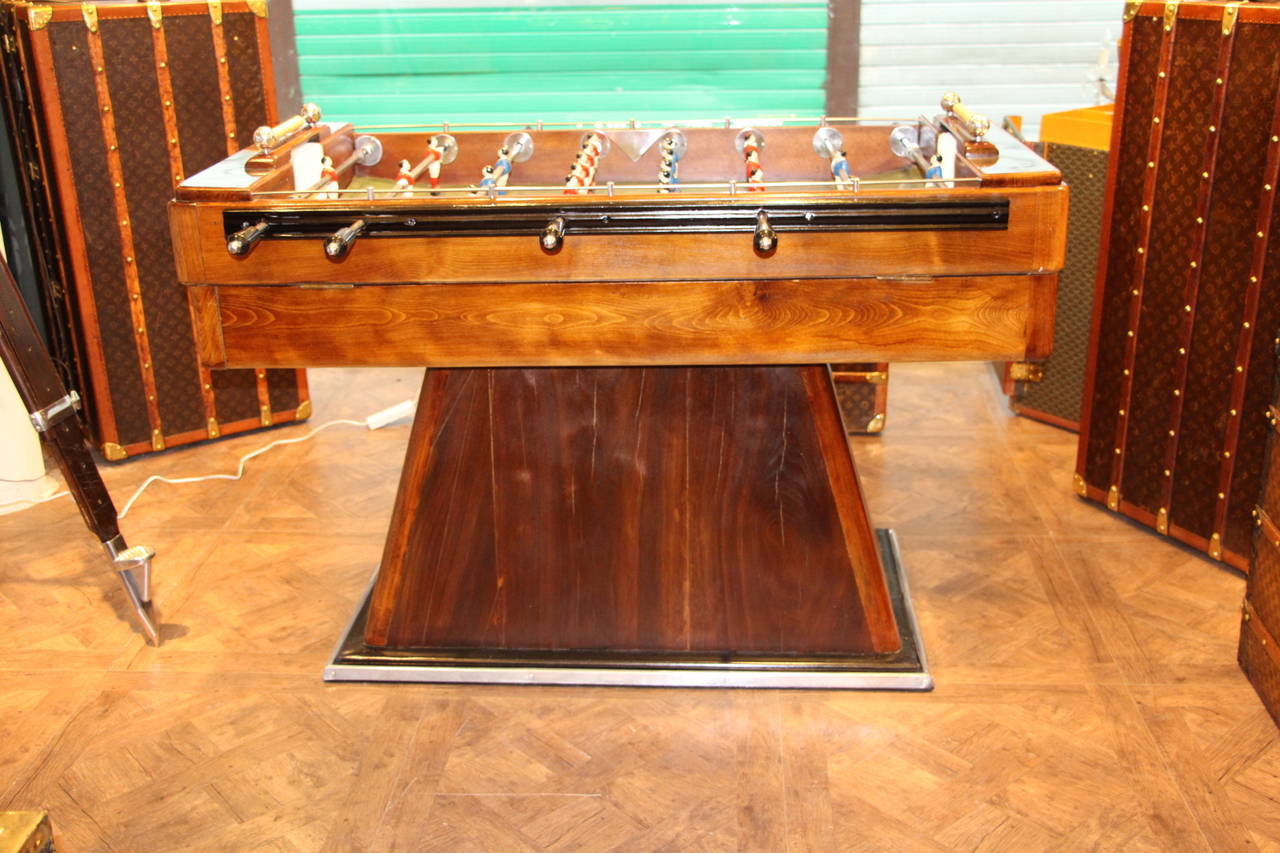 This French beechwood and ebonised table on shaped supports has got painted steel players and polished aluminum fittings..It is a beautiful decorative piece as well as a fabulous game table in working order...