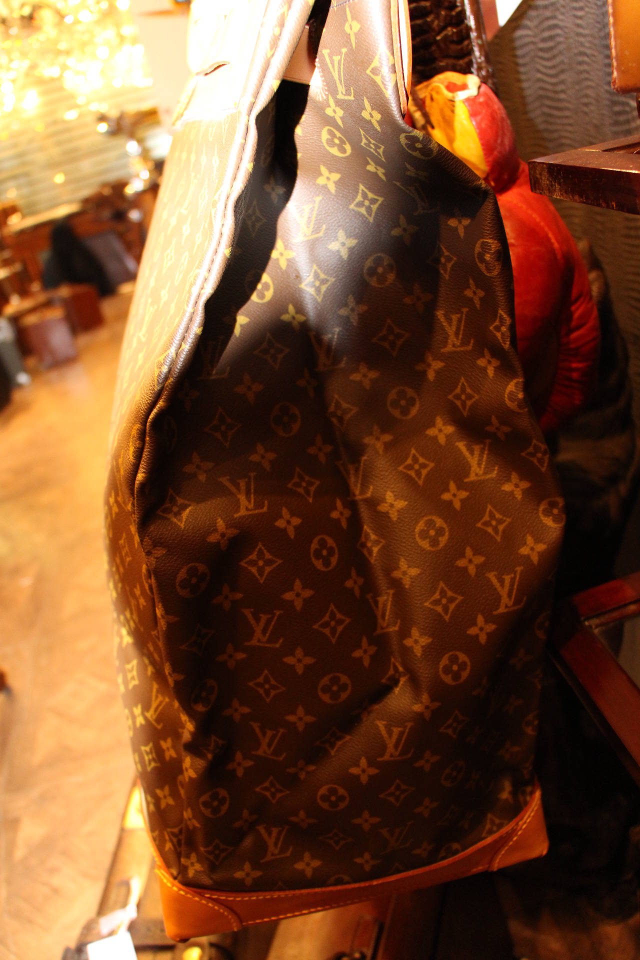 This Louis Vuitton steamer bag features the 