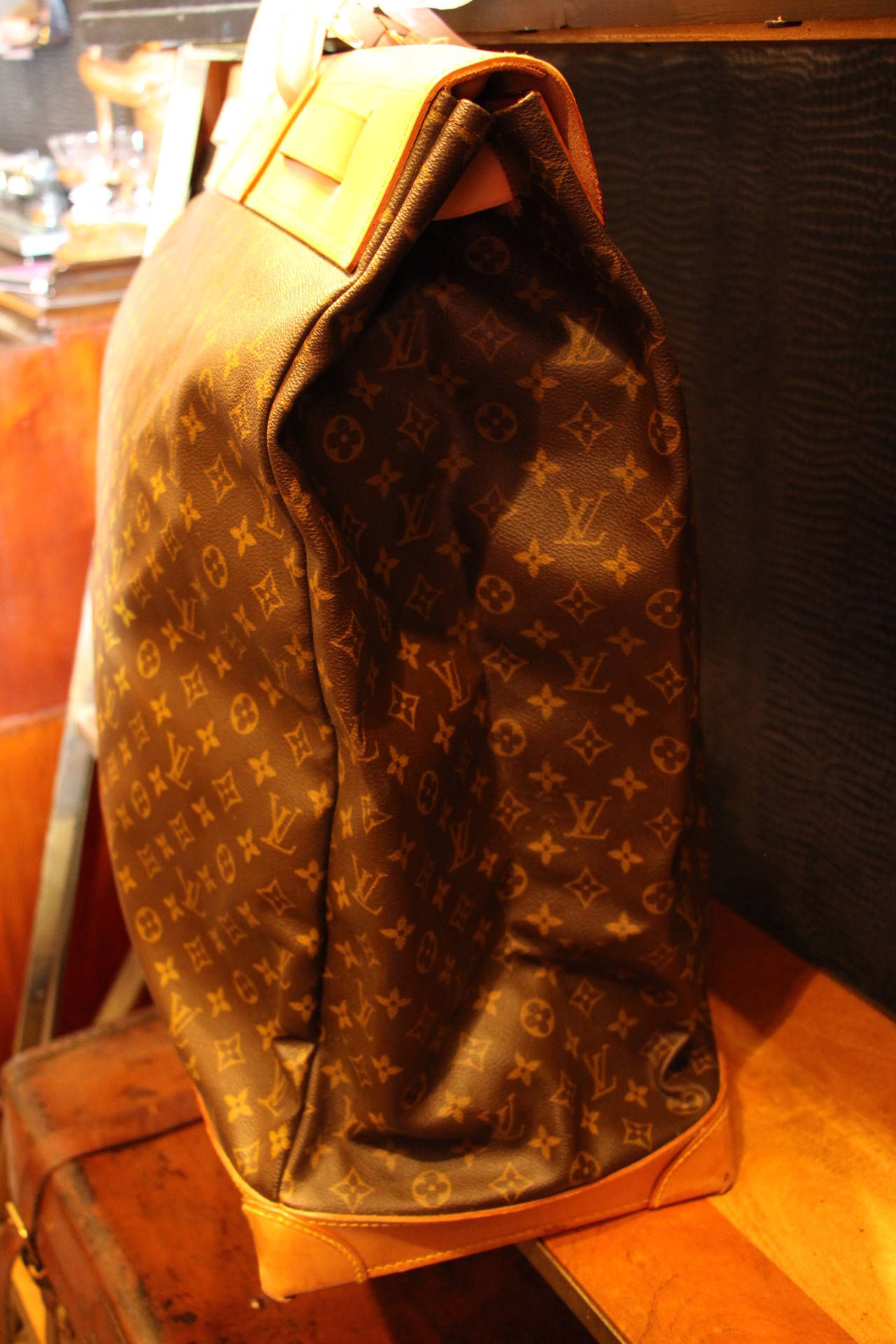 This Louis Vuitton steamer bag features the 