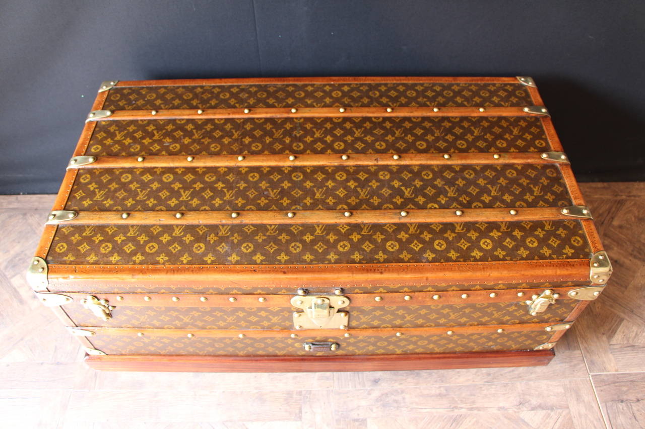 This beautiful Louis Vuitton trunk is stenciled monogramm canvas and lozine trim.
It has brass hardware and has a beautiful warm patina.
Its interior is all original, complete with its removable tray featuring 2 small compartments.
 Custom made