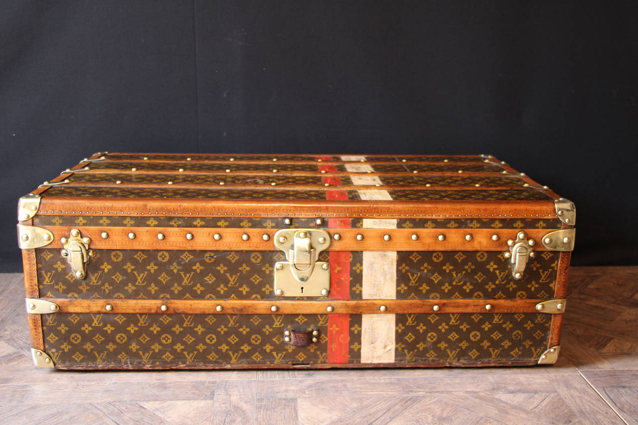 This beautiful Louis Vuitton trunk is stenciled monogramm canvas and lozine trim.
It has brass hardware and has a beautiful warm patina.
Its interior is all original except the lid that has been relined.It is complete with its removable tray