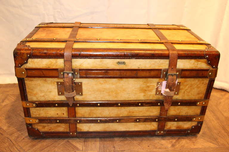 This vellum trunk has got leather trim and leather corners and a gorgeous patina.It is all original and features a very nice beige linen interior, with two removable trays and a red leather pocket.
Free shipping to many destinations,have a look at
