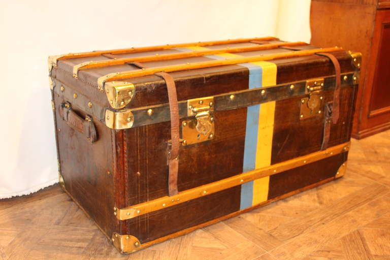 This leather trunk has got a very warm patina and would be perfect as a coffee table.It has all brass fittings and a clean original interior.