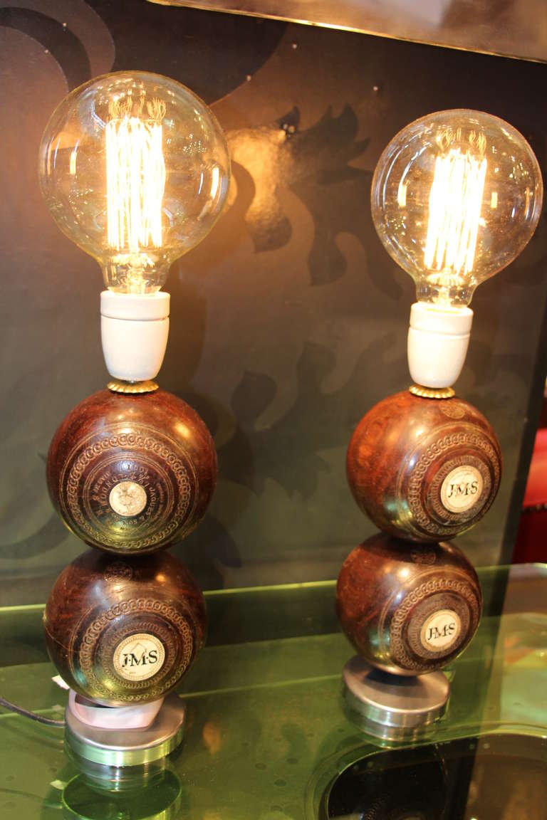 This pair of lamps is very unusual, made with mahogany bowls.