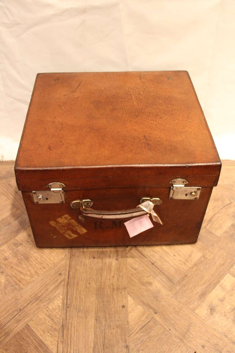 This leather hat box has got a very warm patina and can easily used as a bedside cabinet or end of a sofa.