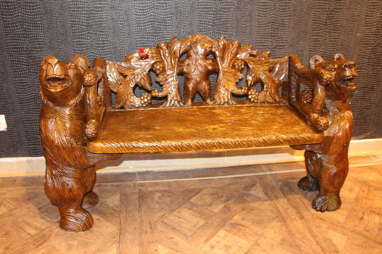 This little black forest carved wood bench has got a beautiful patina and features many details.
It is very well balanced and in very good condition. Perfect to be used as end of bed or in a lobby.