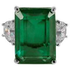 Synthetic 25 Carat Rectangular Step Cut Emerald Diamond Ring