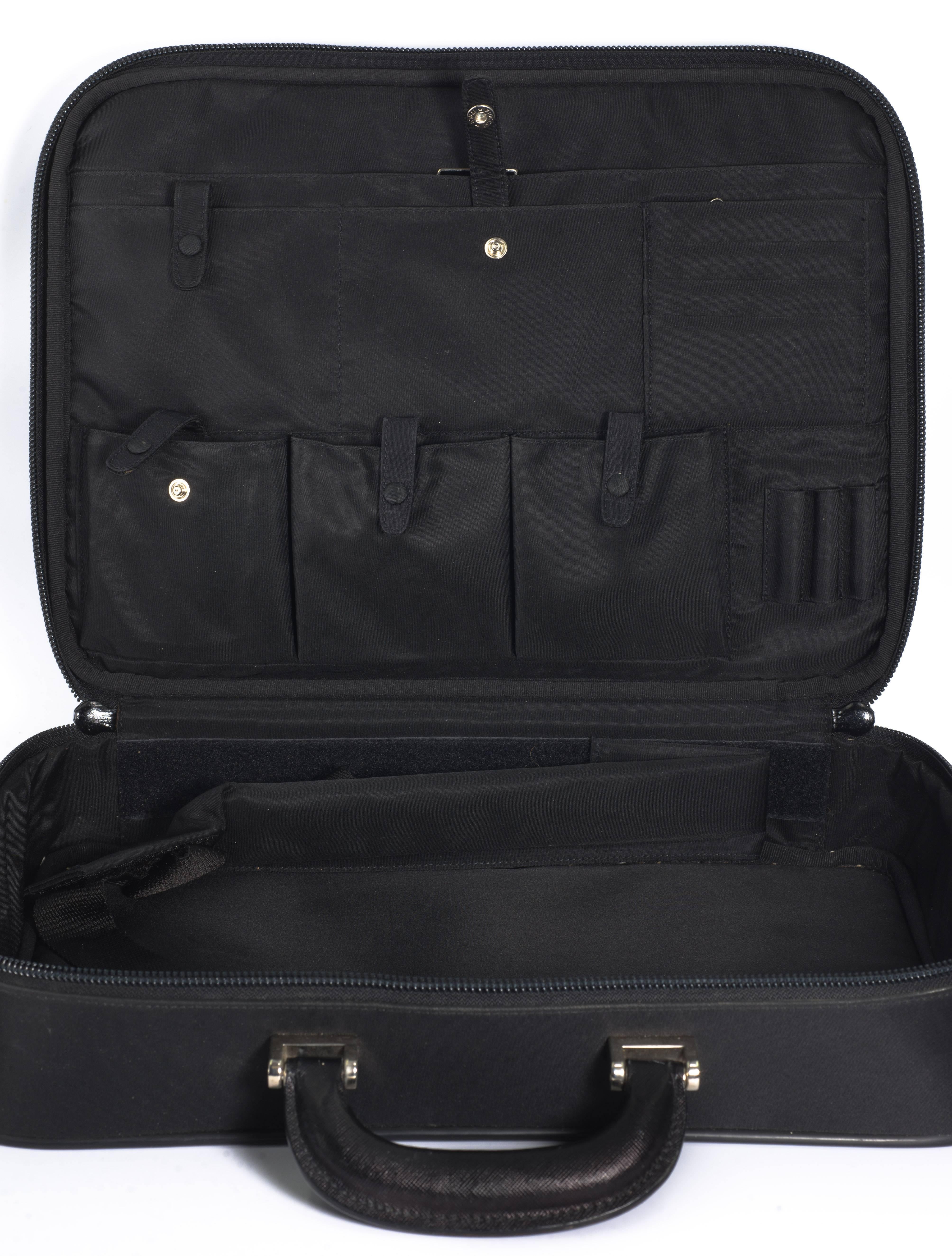 Prada nero nylon computer shoulder briefcase. Interior 16'' by 12''. 
Saffiano leather trim, palladium hardware.
Adjustable, with original registration etc cards. Outside side zippered pocket. Perfect for either shoulder or briefcase use. Bought at