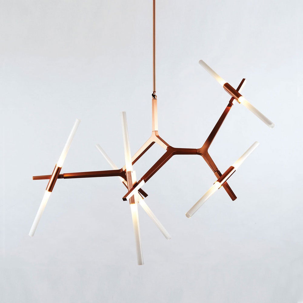 A modular metal structure, with articulated joints that allow the bulbs to be rotated and arranged in a multitude of ways, Agnes's glowing, glass tubes were inspired by the light's origins as a candelabra.

Bulbs can be rotated to either a tilted