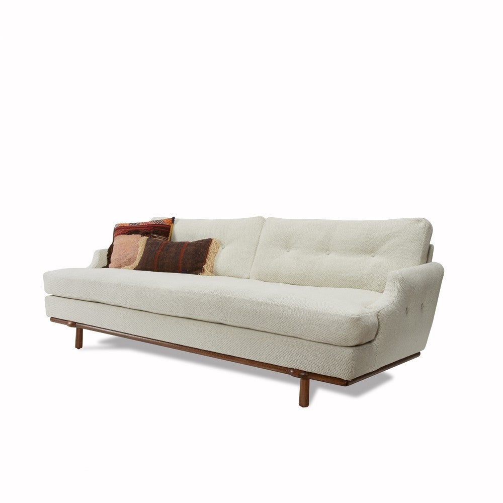 Jason Miller combines the proportions of mid-century sofas with Shaker woodwork and traditional upholstery detailing for The Future Perfect's Kent sofa. These disparate influences come together to make a contemporary sofa that feels simple and