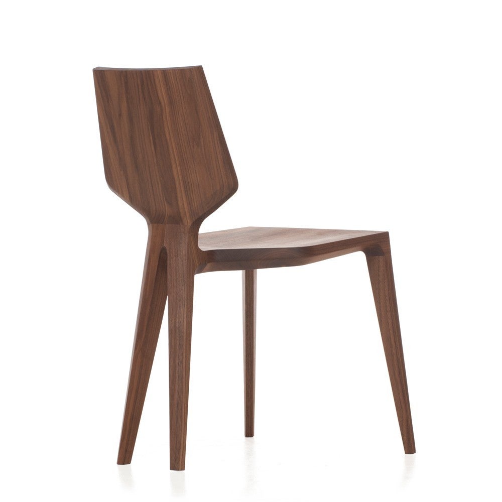 Mary's Chair, crafted in solid hardwood, is substantial yet delicate, sculptural yet highly functional. It was inspired by a visit to the Cathedral of St. Mary of the Assumption in San Francisco. Matthew Hilton was moved by the contrast of the