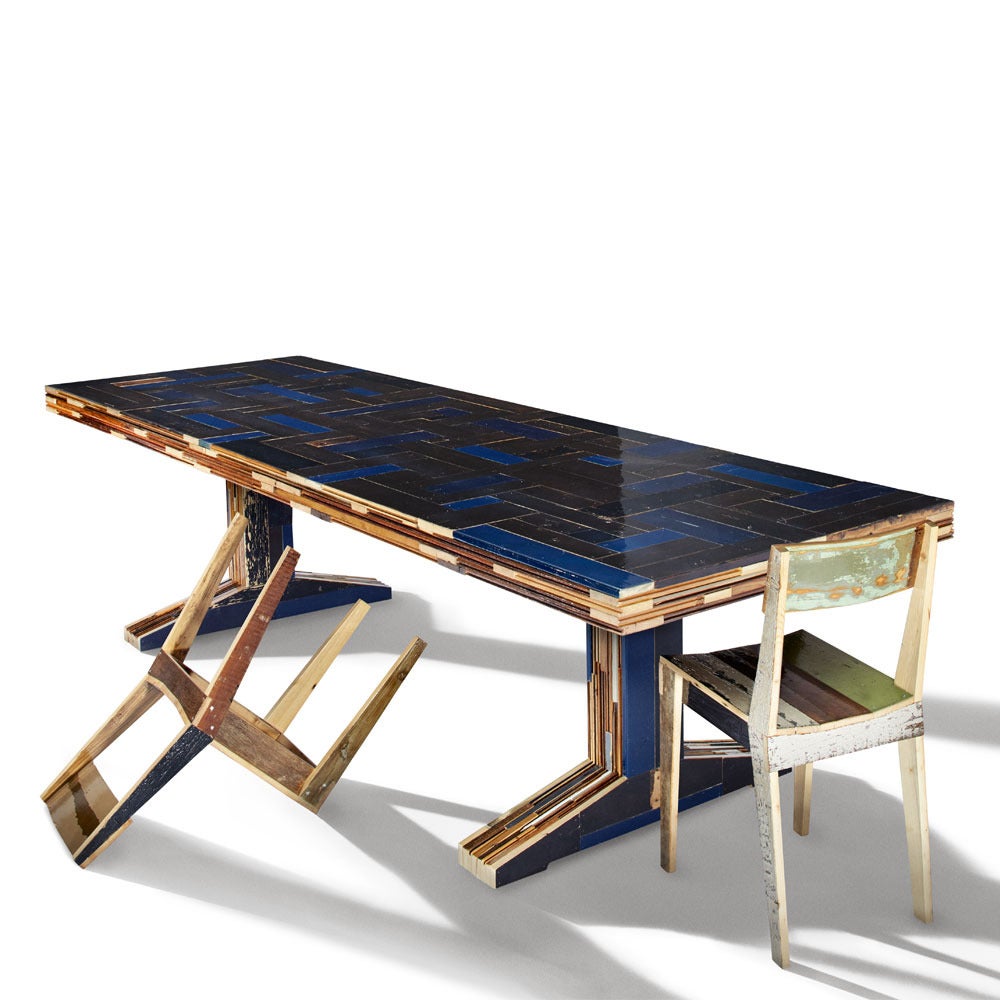 The waste table is meticulously crafted in Piet Hein Eek's studio using traditional wood-working technique. It brings his quintessential vocabulary of recycled wood collage to a table design of exceptional grace. Each table is completed with a