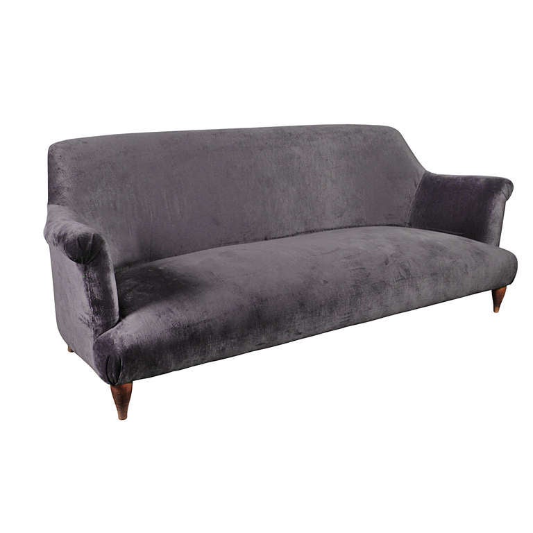 The Goddard sofa, designed by Russell Pinch for The Future Perfect, melds traditional elements with a contemporary, refined shape. Its sprung back and seat are designed to give maximum comfort and support whilst also delivering a light and elegant