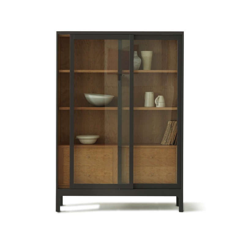 The Joyce cabinet, inspired by Victorian optometrists, has sliding glass-fronted doors and a timber-lined interior with four adjustable shelves and four drawers. There are 2 cable grommets above the drawers.

Please note: This cabinet is a floor