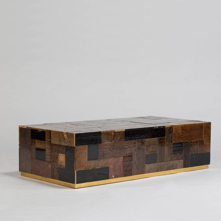 Piet Hein Eek's waste Coffeecube is a truly solid object, made up entirely of small scraps of artfully stacked wood, the simplicity of the design highlights the scrapwood material.

The Waste CoffeeCube is produced with a high gloss finish, which