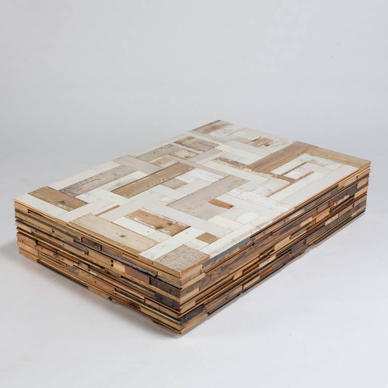 The Waste Coffeecube in Scrapwood is meticulously crafted in Piet Hein Eek's studio using traditional woodworking technique. It brings his quintessential vocabulary of recycled wood collage to a table design of exceptional grace. Each table is
