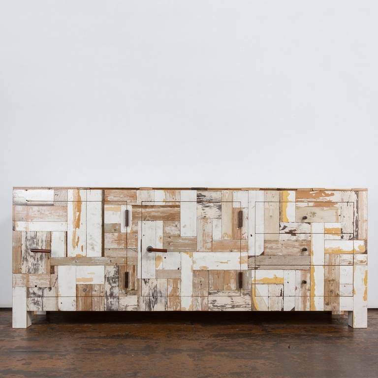 The Waste Cabinet is meticulously crafted in Piet Hein Eek's studio using traditional woodworking techniques. It brings his quintessential vocabulary of recycled wood collage to a cabinet design of exceptional grace. Each piece is completed with a