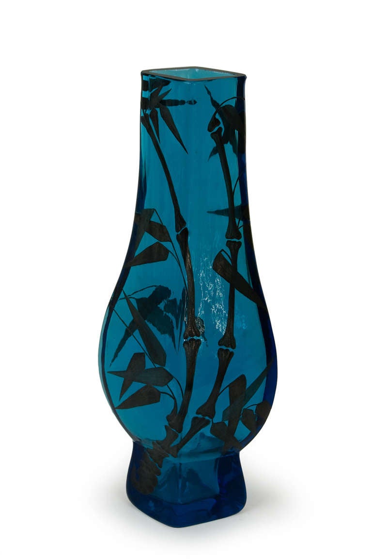 Ballustre shape vase in solid blue crystal moulded by blown. Japanese decor of engraved and painted with enamels bamboos. 