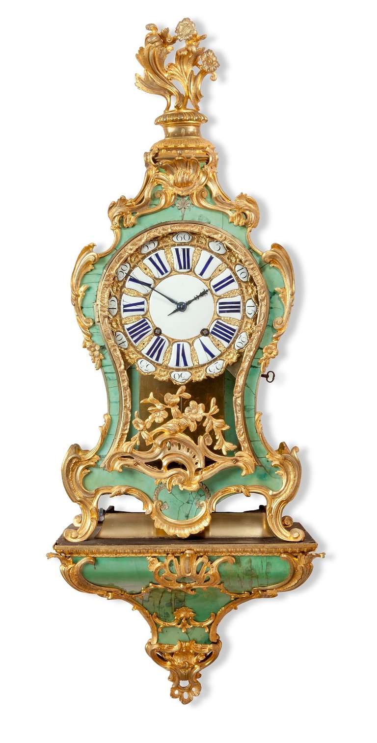 24-cm. twentyfive-piece ornate ormolu dial with blue cartouche Roman numerals and blued shaped hands, spring-driven rectangular plated movement with five knobbed pillars signed Guill.me Gille A Paris of 8-day duration, tic-tac escapament and silk