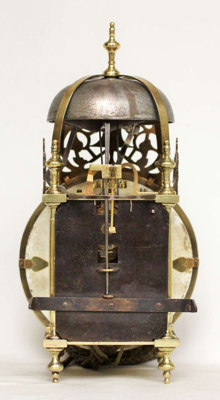 A French Brass Lantern Clock with Rare Porcelain Dial, circa 1750 For Sale 1