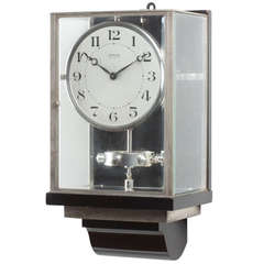 A Rare Art Deco J.L. Reutter Patent Wall Nickel Plated Atmos Clock, circa 1930