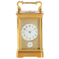Antique A fine French gilt brass Corniche riche carriage clock with alarm, circa 1900